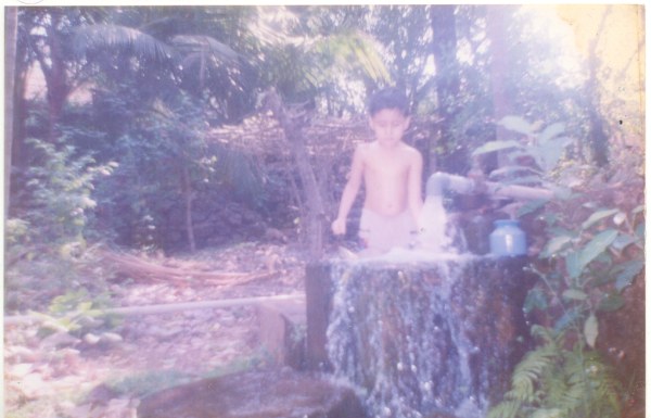 sarthak playing in water.jpg